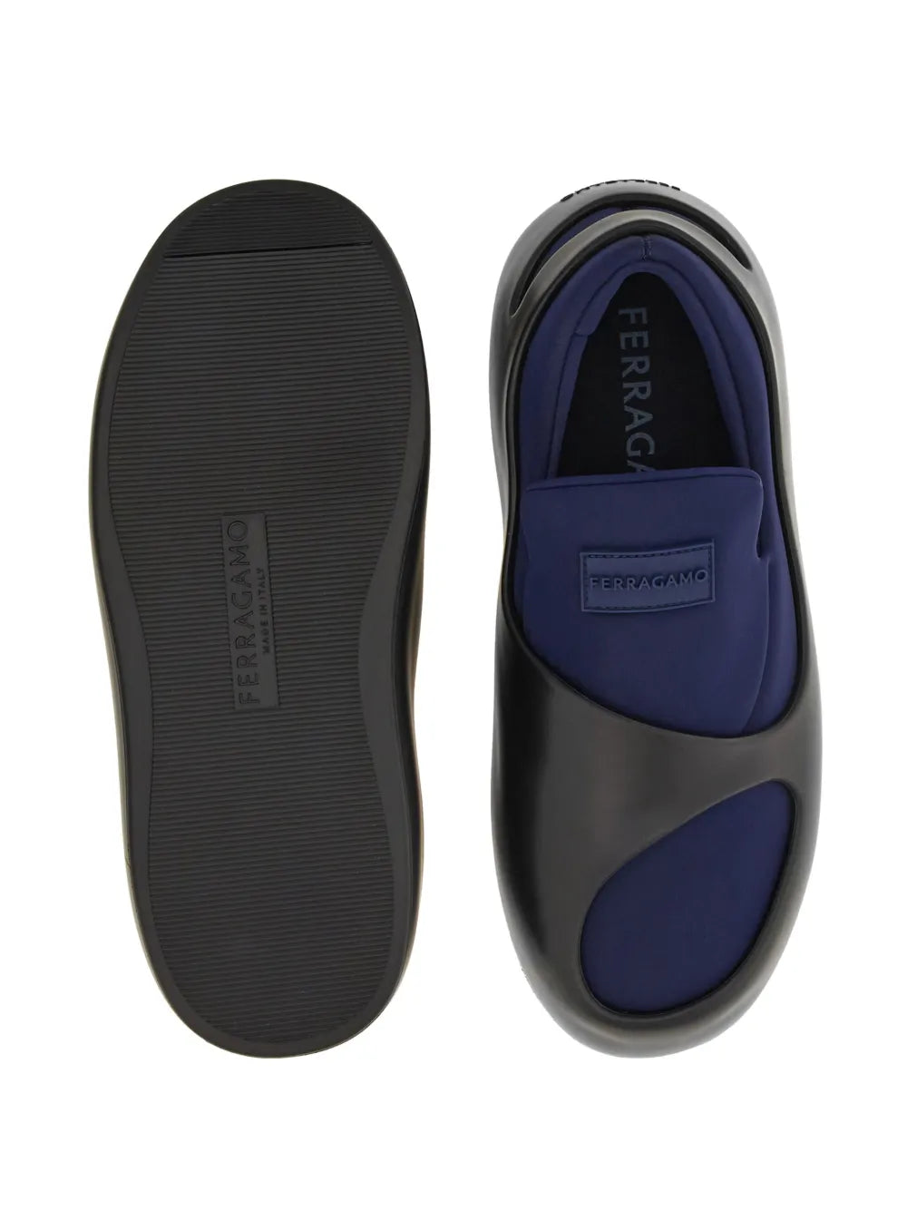 Ferragamo slip-on outsoles and side profile, black rubber with blue interior