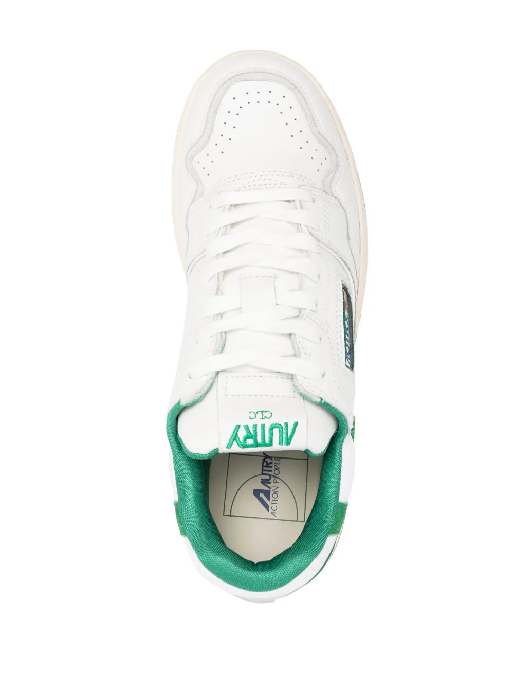 White leather sneaker upper with green-lined collar and lace-up eyelets