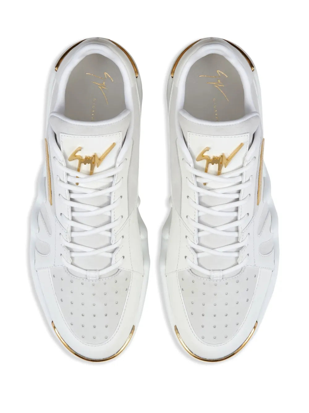 White leather lace-up sneakers with perforated toe and gold-trimmed eyelets