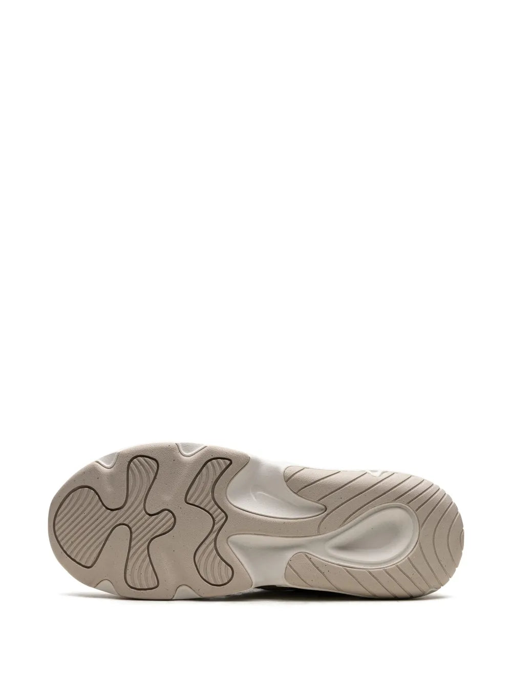 Nike athletic sneaker outsole with textured tread pattern in white and light gray