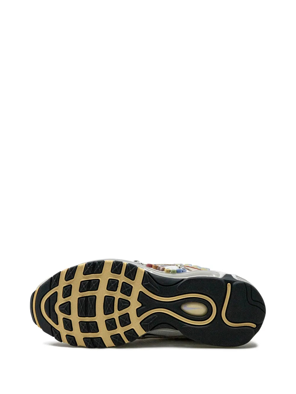 Beige running sneaker outsole with black tread and gold accent lines