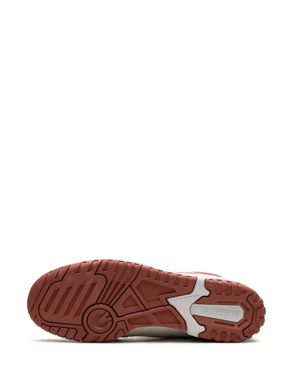 Brown rubber outsole tread with white upper edge and red accents