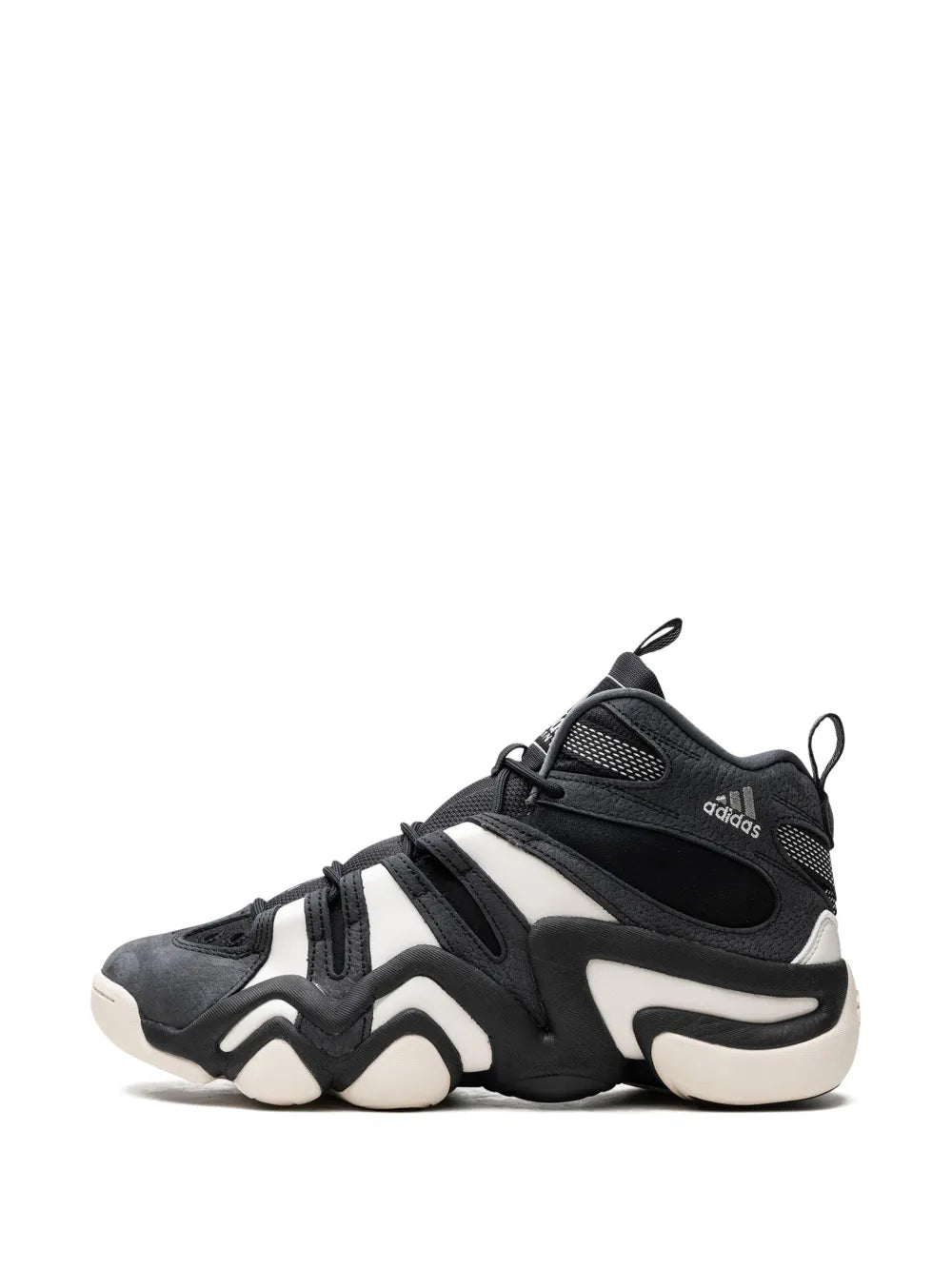 Black adidas low-to-mid sneaker with lace-up straps, mesh upper, and white sole trim