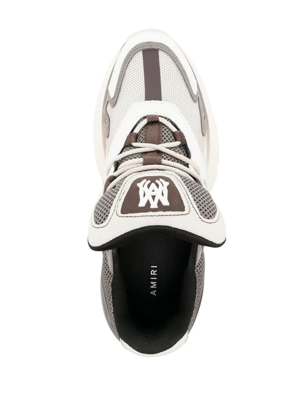 Leather sneaker toe and tongue view in white and gray, lace-up with black lining