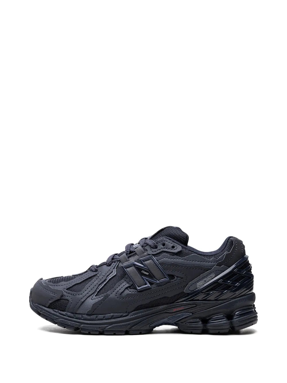 Black lace-up sneaker side profile with textured panels and supportive heel