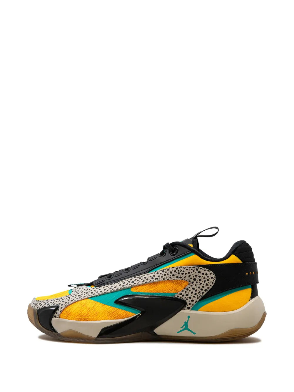 White, black and yellow lace-up sneakers with aqua trim and speckled side panels.
