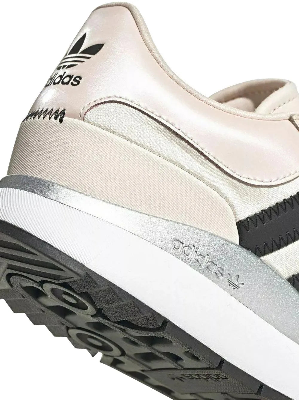 Light beige adidas SL Andridge sneaker showing side adidas logo and black outsole.
