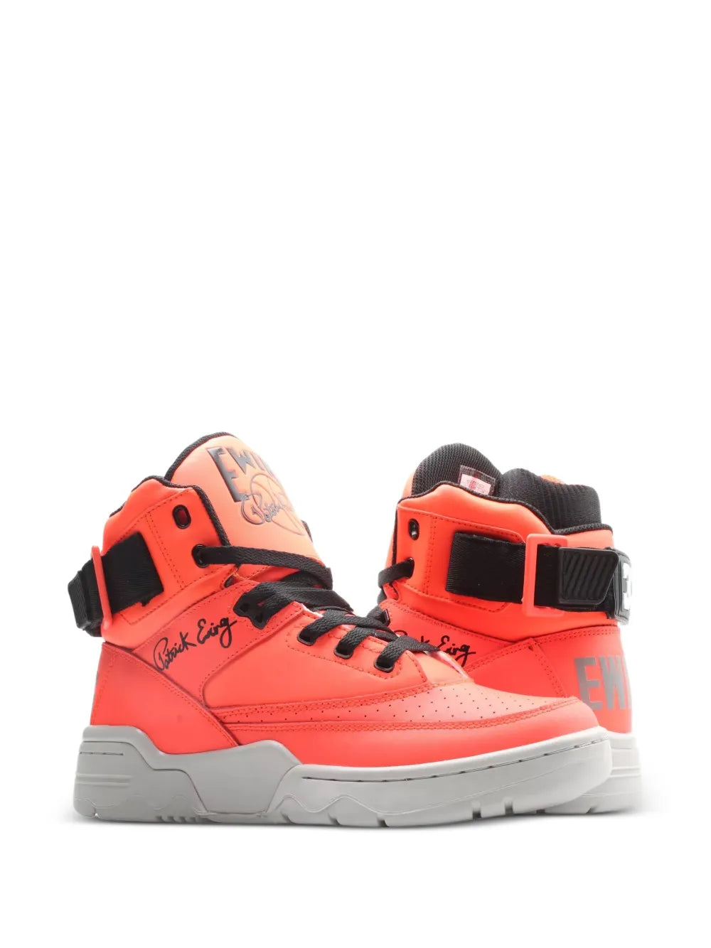 Orange high-top sneaker with black strap and laces, gray sole, heel logo