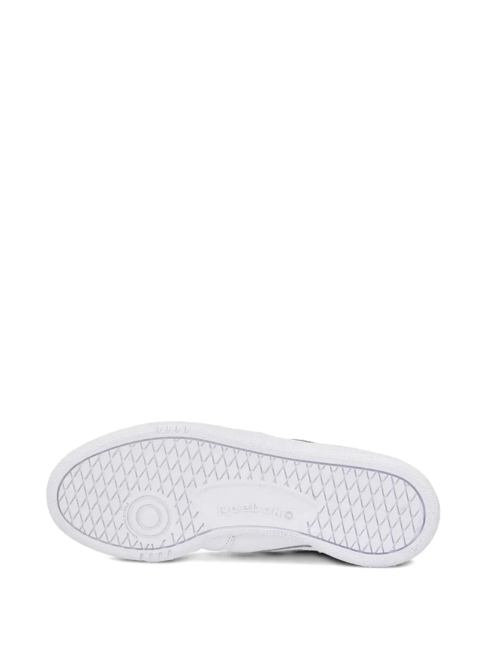 White rubber outsole with textured grip and Reebok logo on heel.