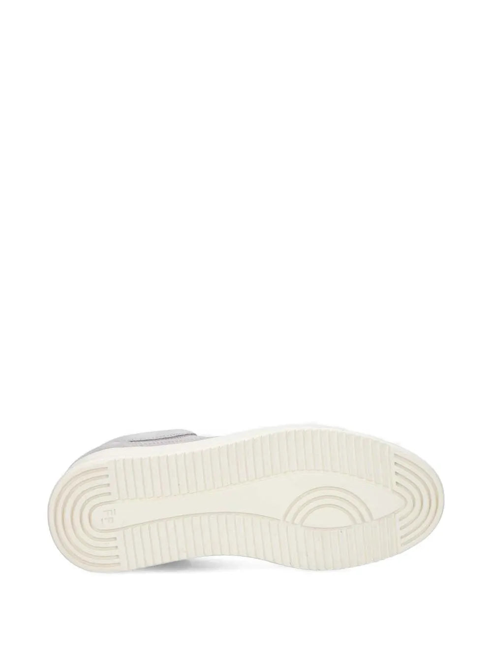 Grey suede sneaker outsole view with cream rubber tread and heel cap