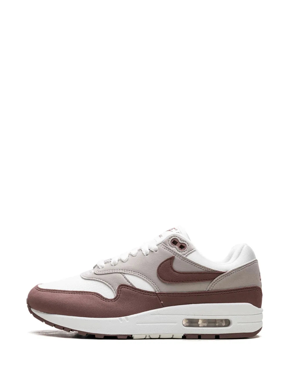 White and brown sneaker with side panel overlays and Air Max window