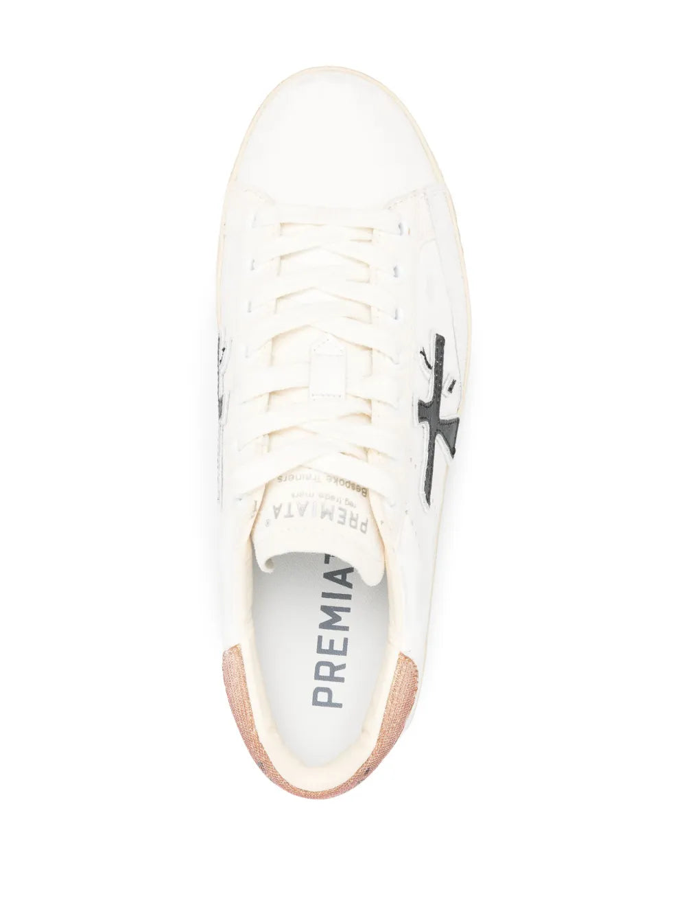 White lace-up sneaker with black side logo and branded insole visible