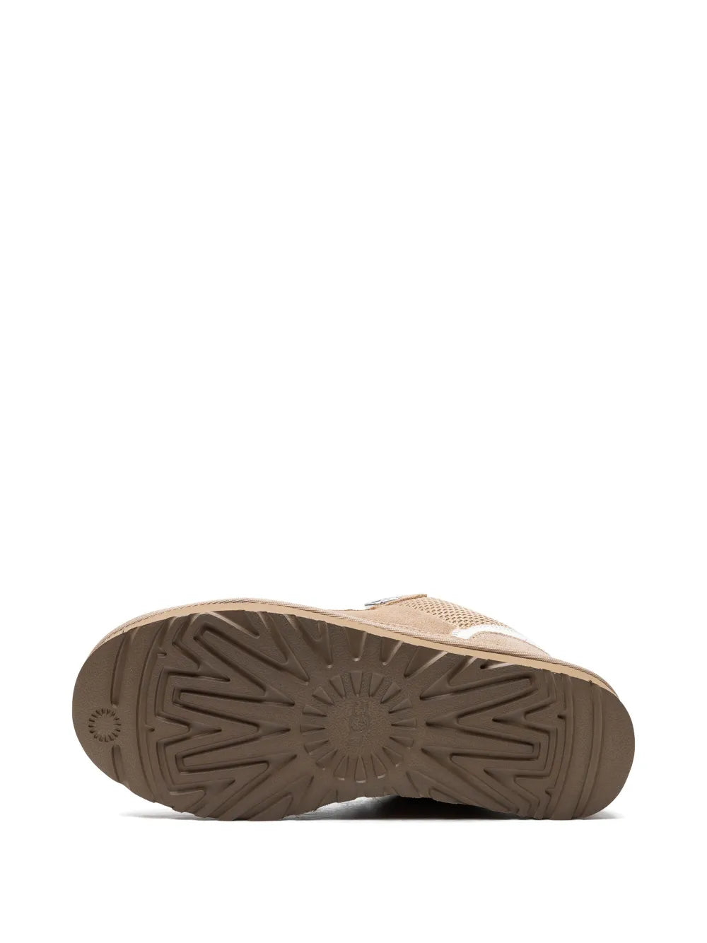 Beige suede high-top sneaker outsole view with textured tread and sidewall grip