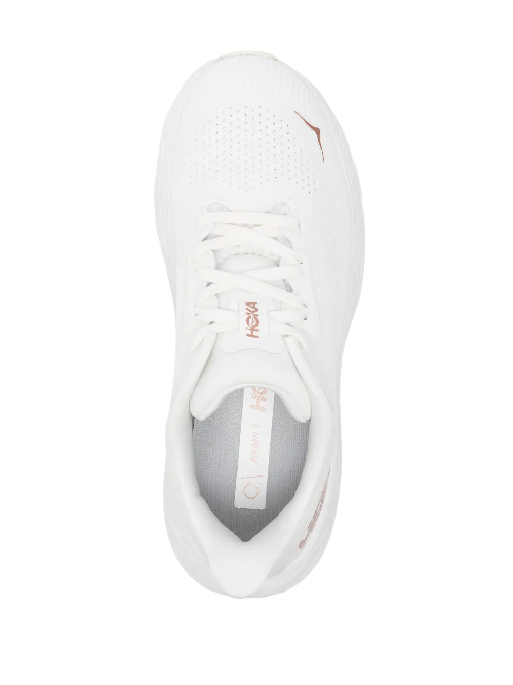 White HOKA logo-print sneakers close-up, lace-up front with cushioned interior
