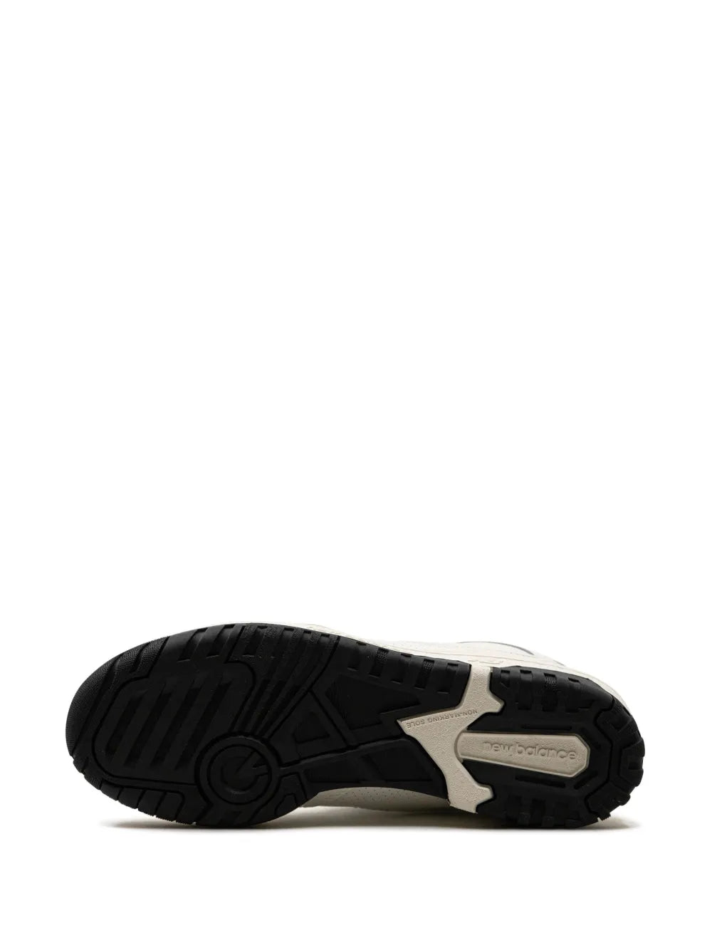 New Balance 550 sneaker outsole, black tread with light beige midfoot panel