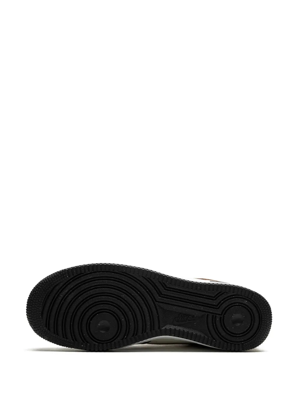 Black rubber outsole with circular tread pattern