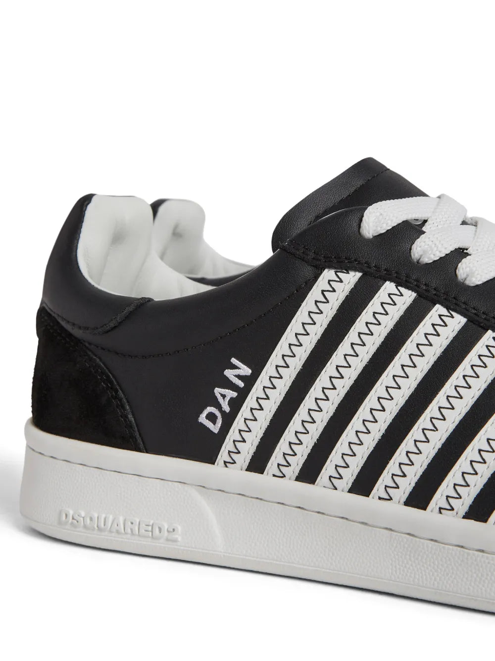 Low-top sneakers black with white laces, 'DAN' stripe detail and Dsquared2 on sole