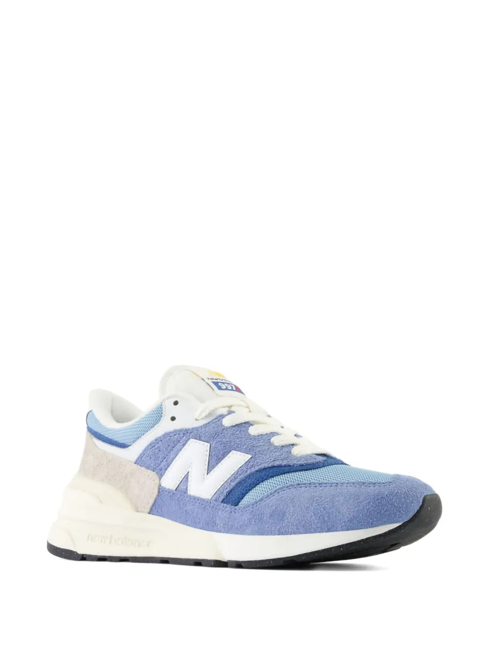 New Balance 997R light blue suede sneakers, side view with lace-up and N logo