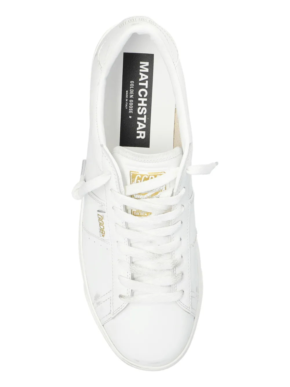 Matchstar sneakers in optical white, tongue label visible and lace-up front