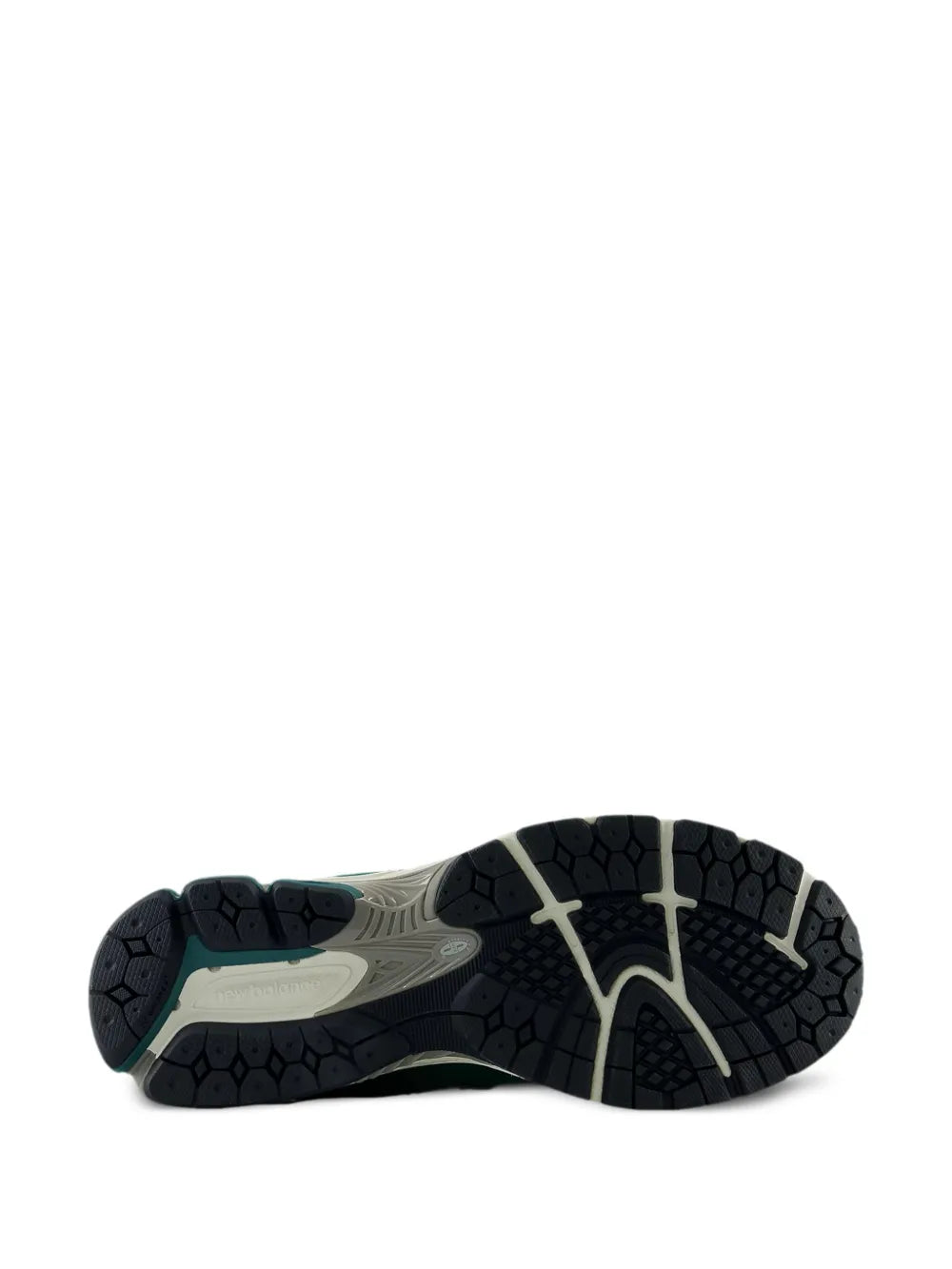 New Balance 2002R sneakers outsole view with textured dark tread and light gray midsole