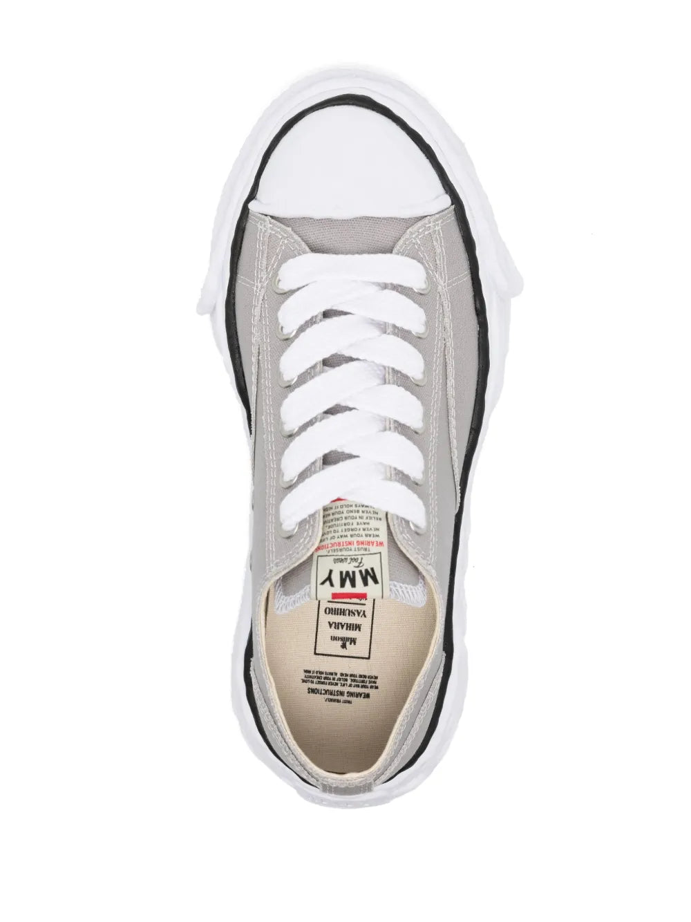 Gray low-top sneakers top view with white laces and interior size label