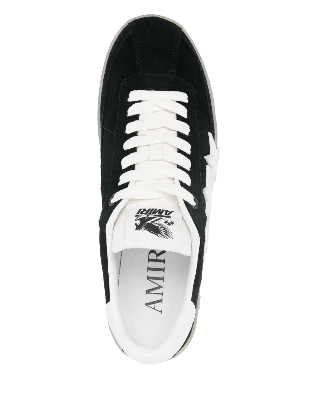 Black low-top sneakers, white laces; AMIRI text on the tongue and footbed