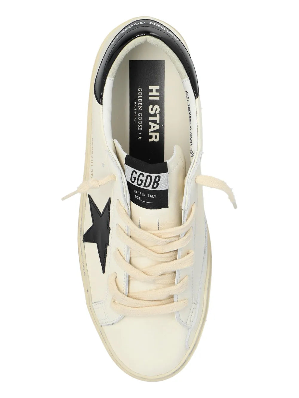 Close-up of sneaker tongue and laces with “GOLDEN GOOSE” label