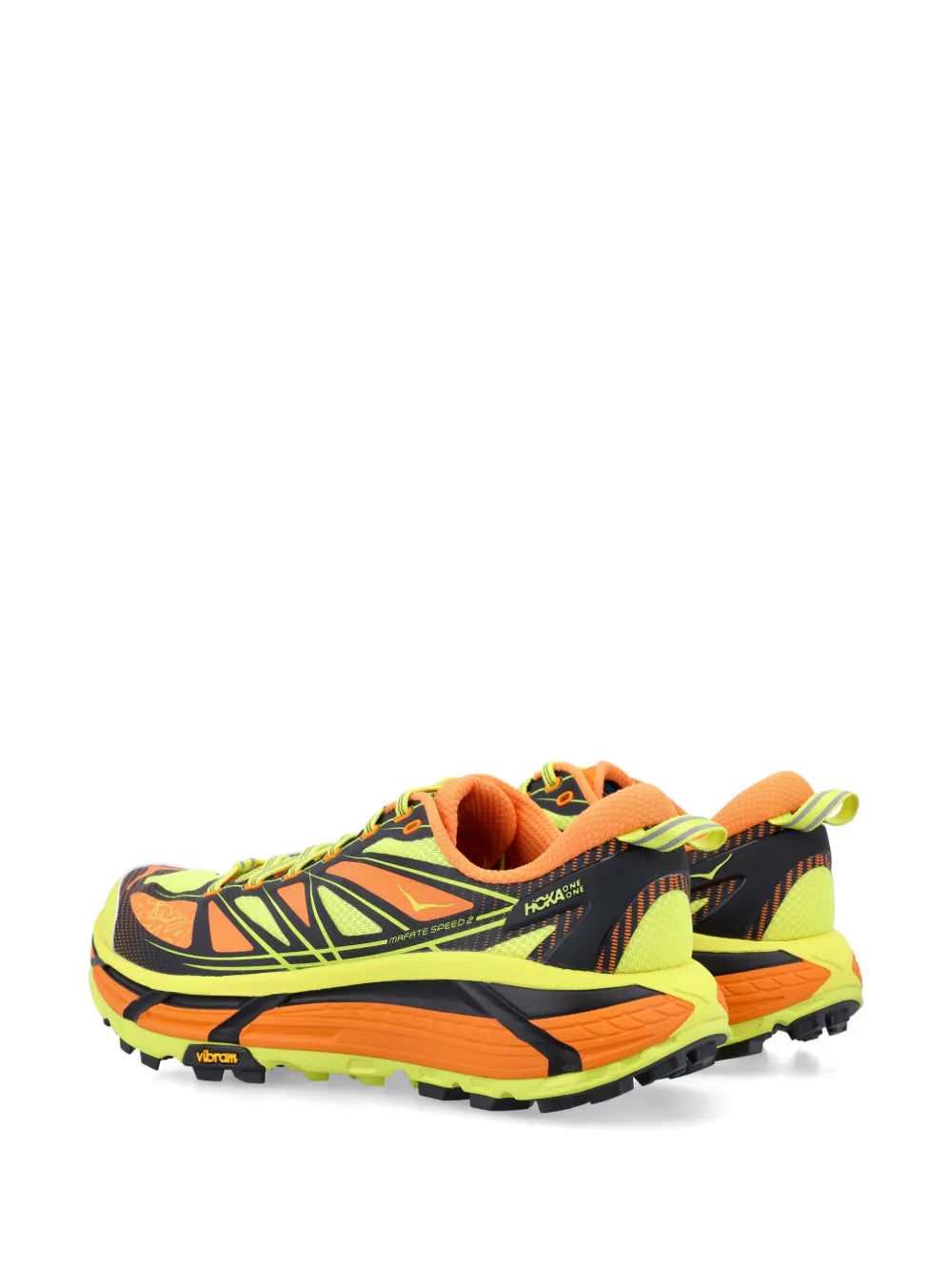 HOKA trail running shoe with orange heel collar, black sidewall, bright neon outsole