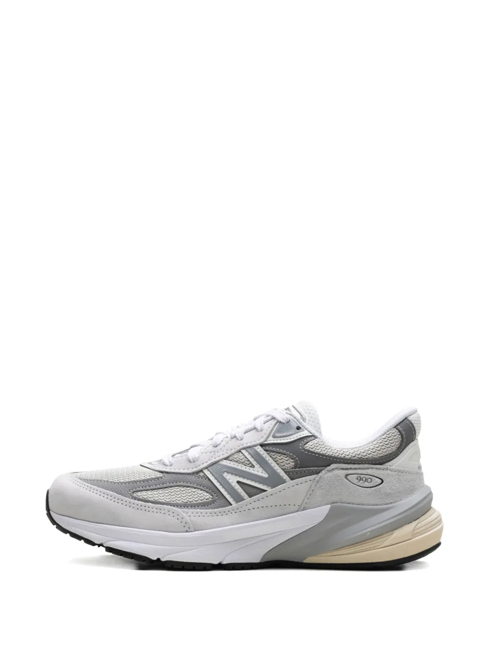 Grey New Balance 990V6 sneakers, front side view, lace-up with tan midsole