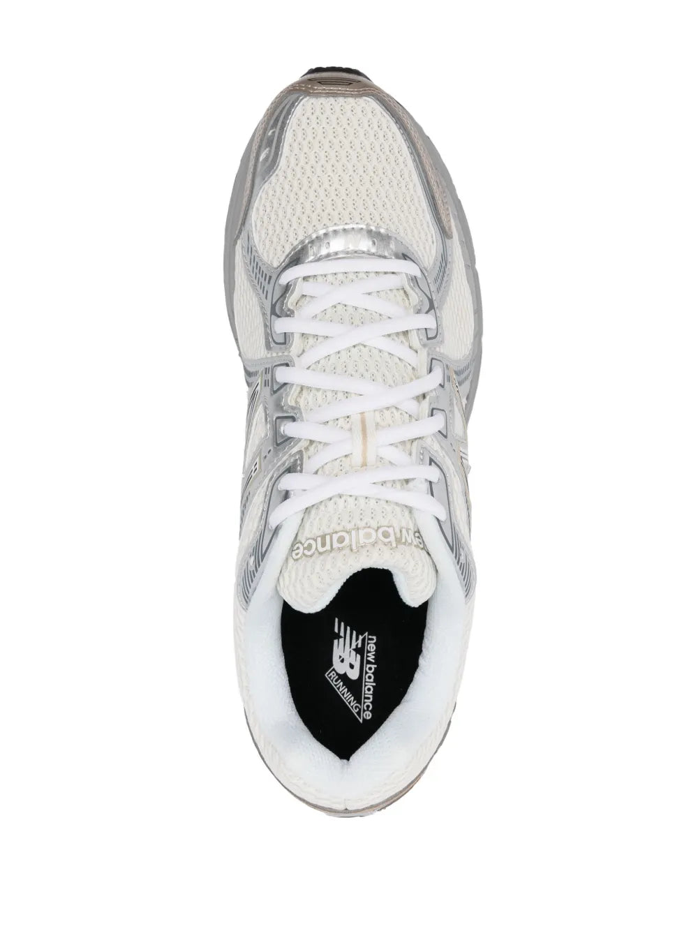New Balance 860V2 shoe, front view with white laces and black tongue label