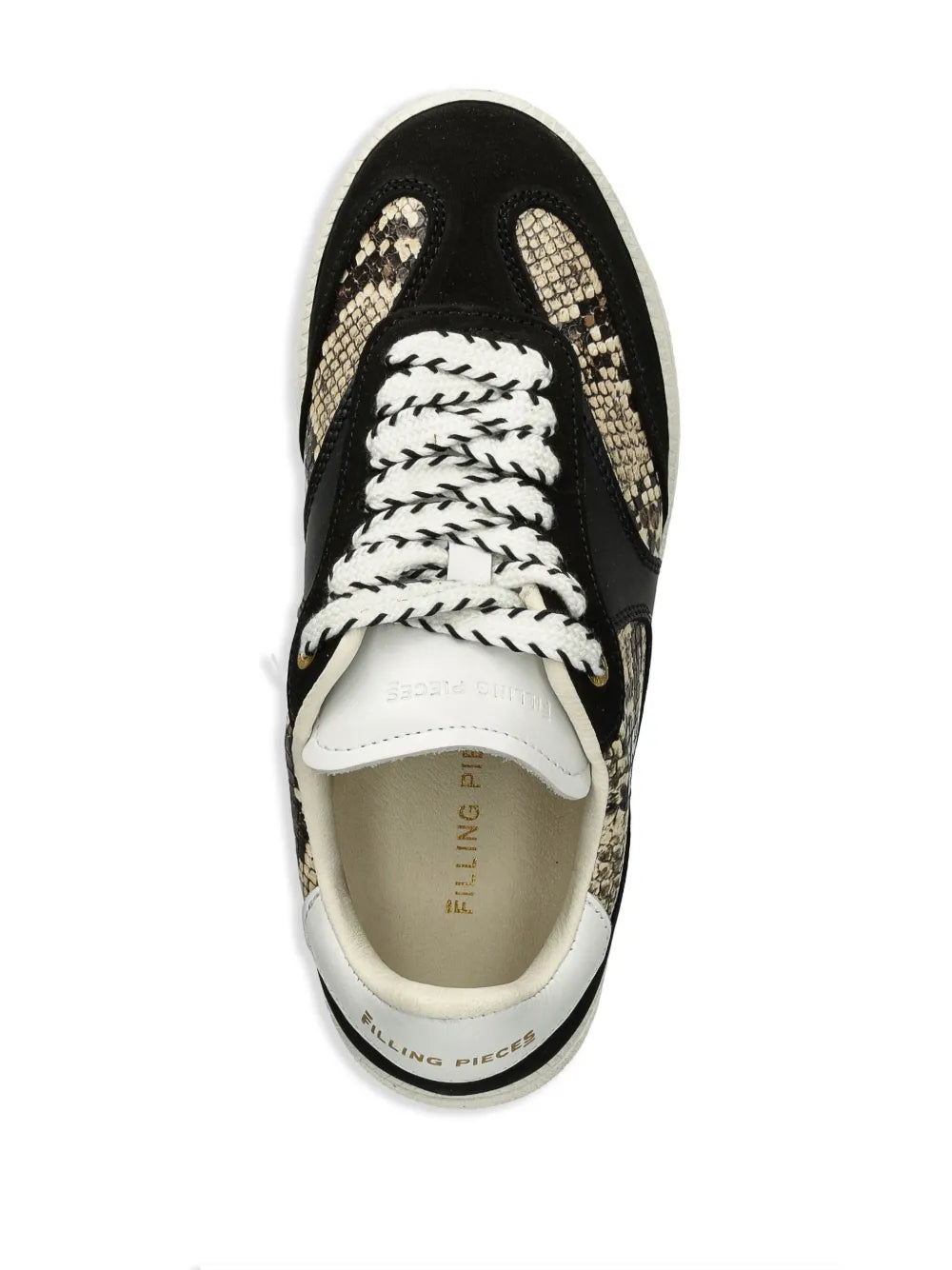 Black sneaker top view with white laces and snake-print tongue panel