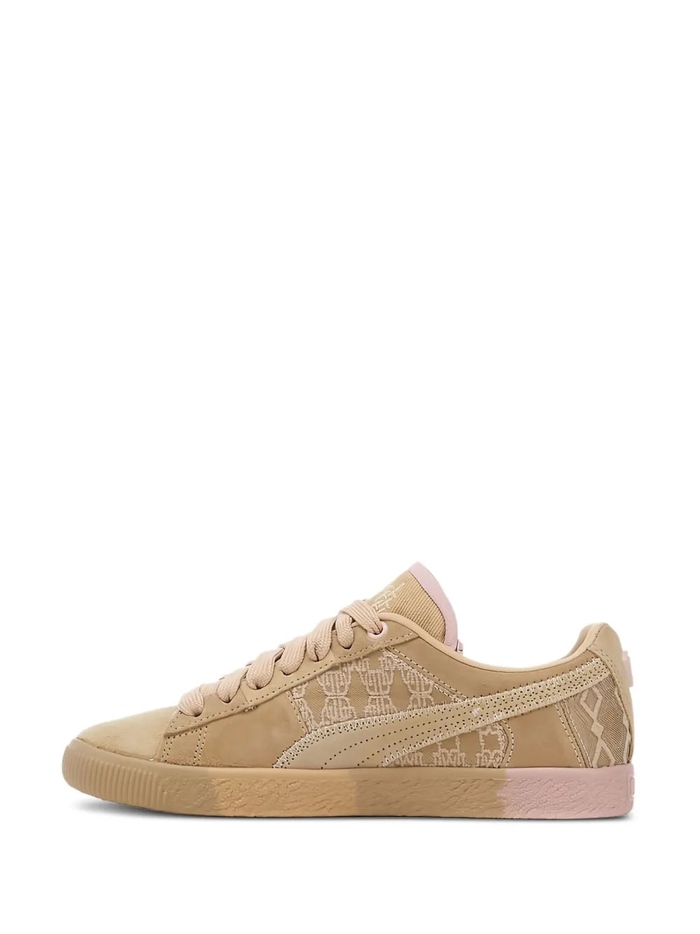 Beige low-top lace-up sneakers, front quarter view with patterned details