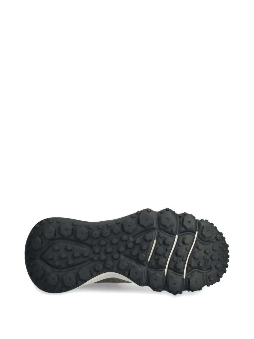 Under Armour trail running shoe sole, black rubber outsole with deep trail lugs