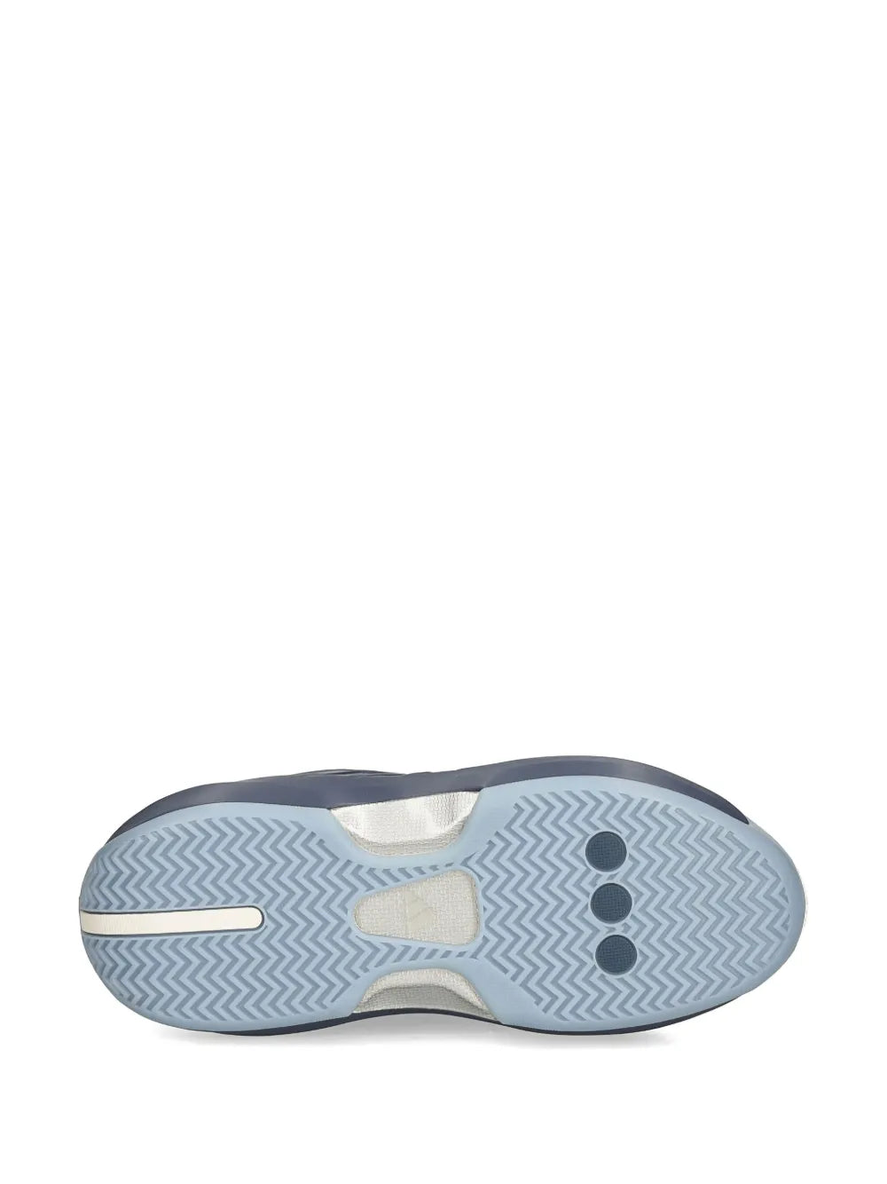 Navy and white sneaker outsole with textured traction pattern