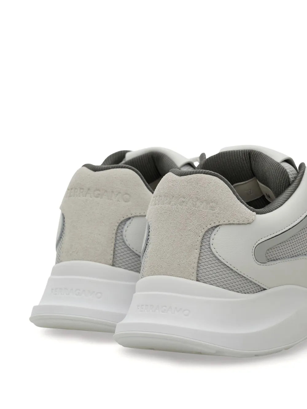Ferragamo Gancini light grey and white sneakers, rear view with cushioned heel and logo detail