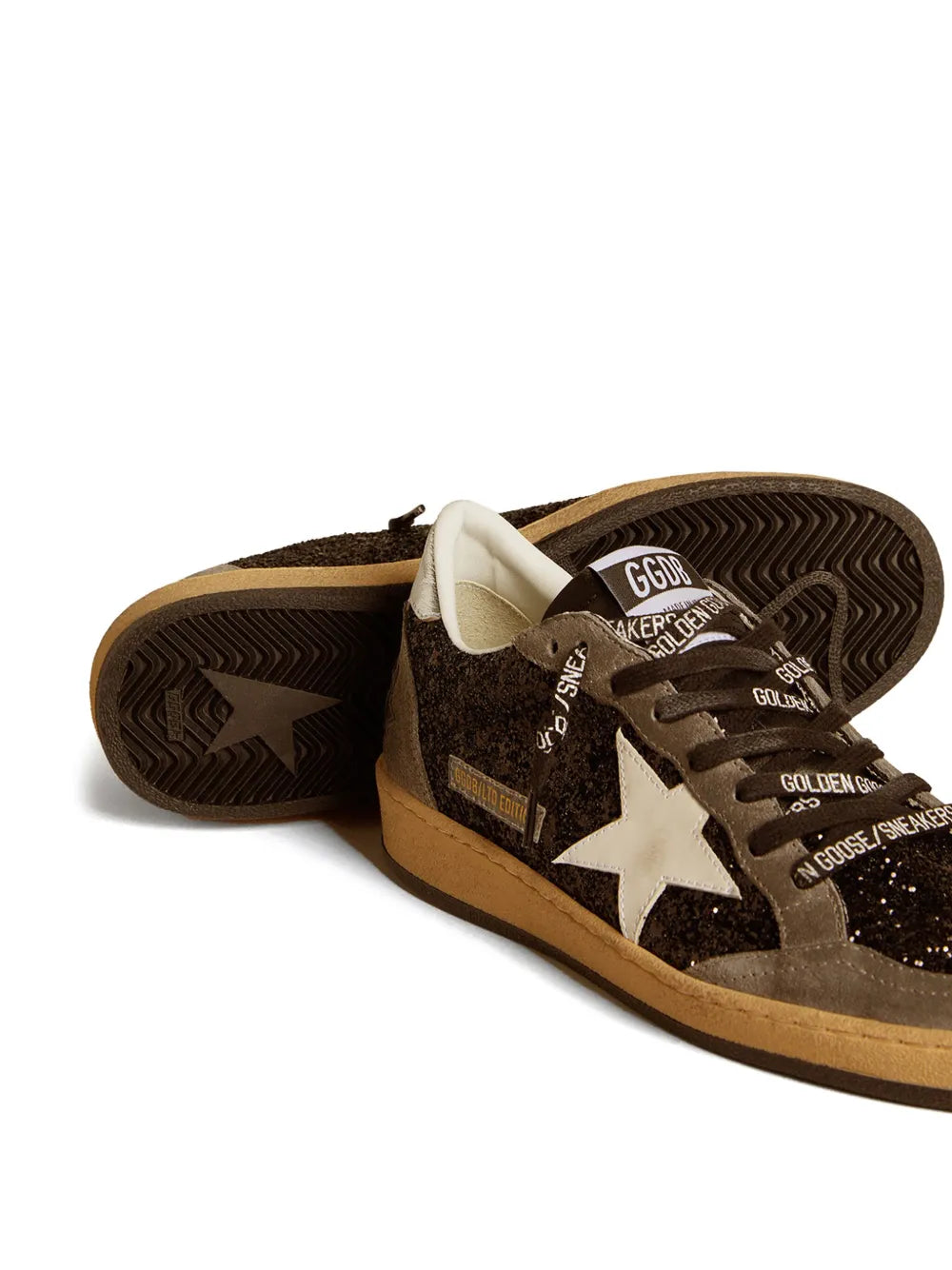 Low-top sneakers with patterned rubber outsole and white star side panel