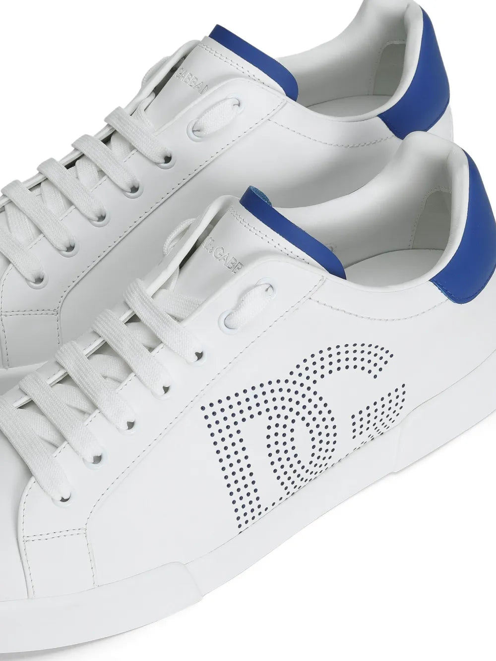 Dolce & Gabbana Portofino white sneakers close-up, perforated DG logo and laces