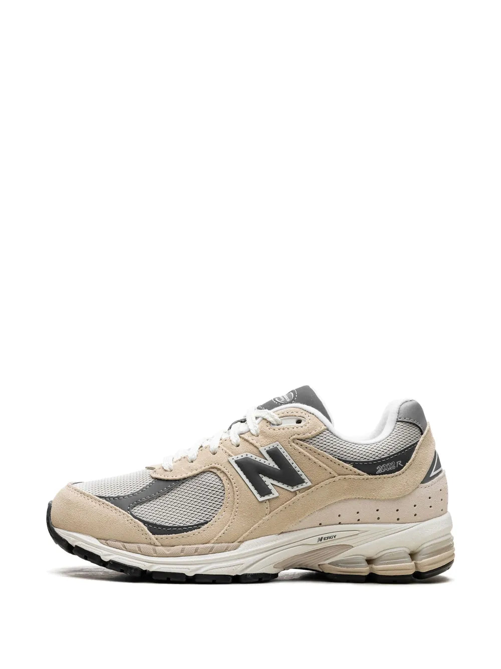 Beige sneaker with gray toe, tan overlays, and N logo on side