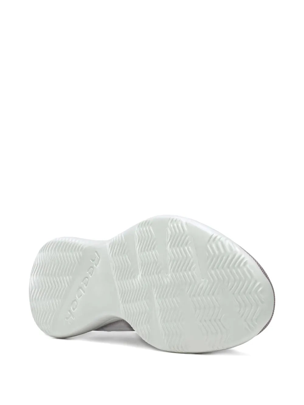 White rubber outsole for purple Reebok sneakers with tread pattern