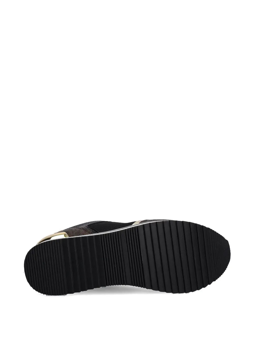 Black sneaker outsole with ridged tread and white midsole edge