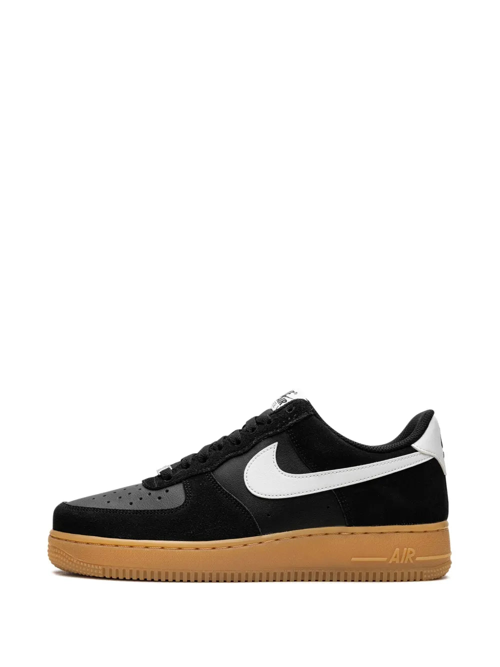 Black Nike low-top sneakers with white swoosh, perforated toe, gum sole