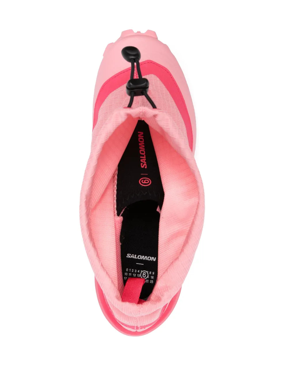 Pink sneaker with open top, black drawstring cord, and interior label text