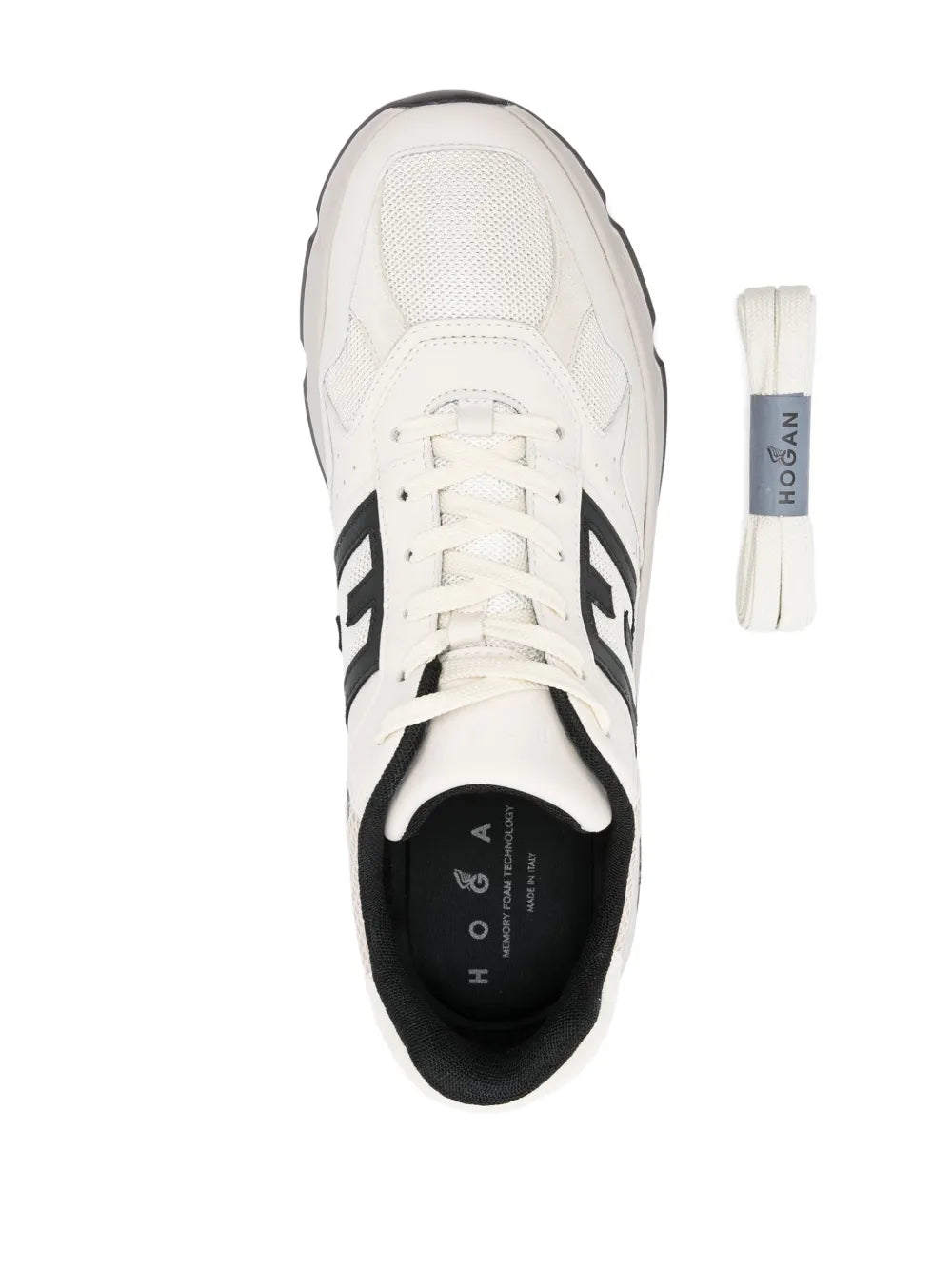Light beige sneaker with lace-up vamp and black interior branding