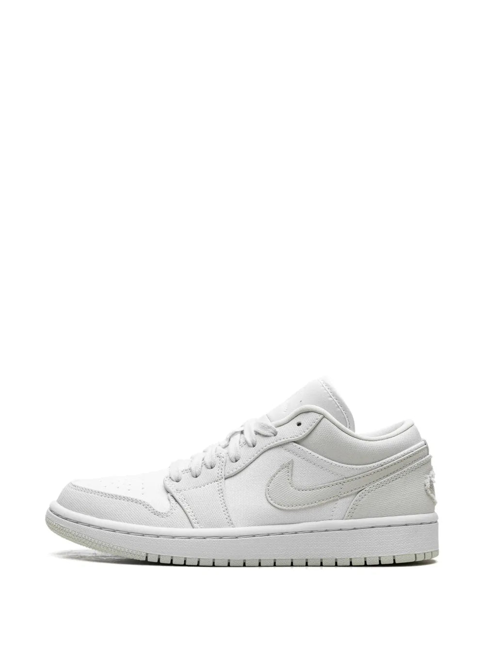 White low-top lace-up sneaker with Swoosh logo and lightly textured side panels