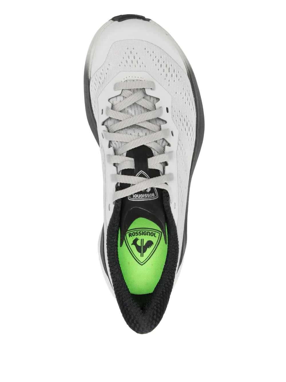 Grey/white trail shoe showing green insole insert, lace-up front, black lining