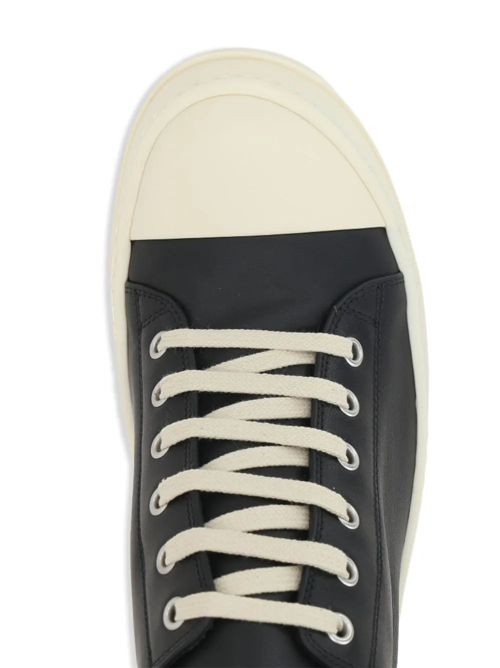 Black leather lace-up sneakers with off-white laces and toe cap detail
