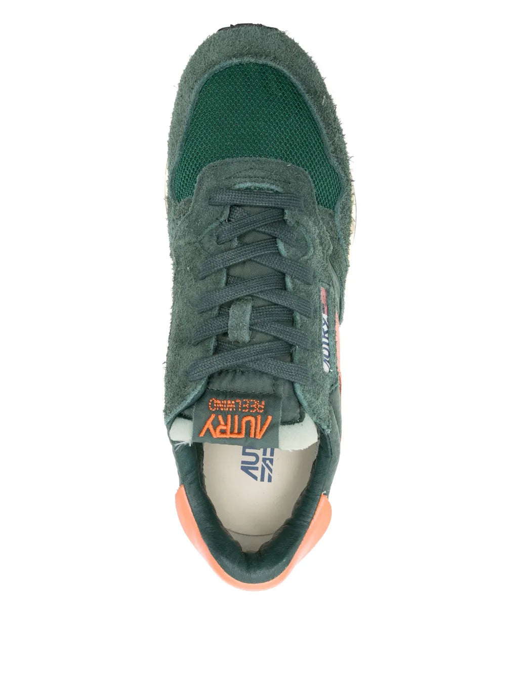 Forest green lace-up sneakers with orange collar lining and cream midsole
