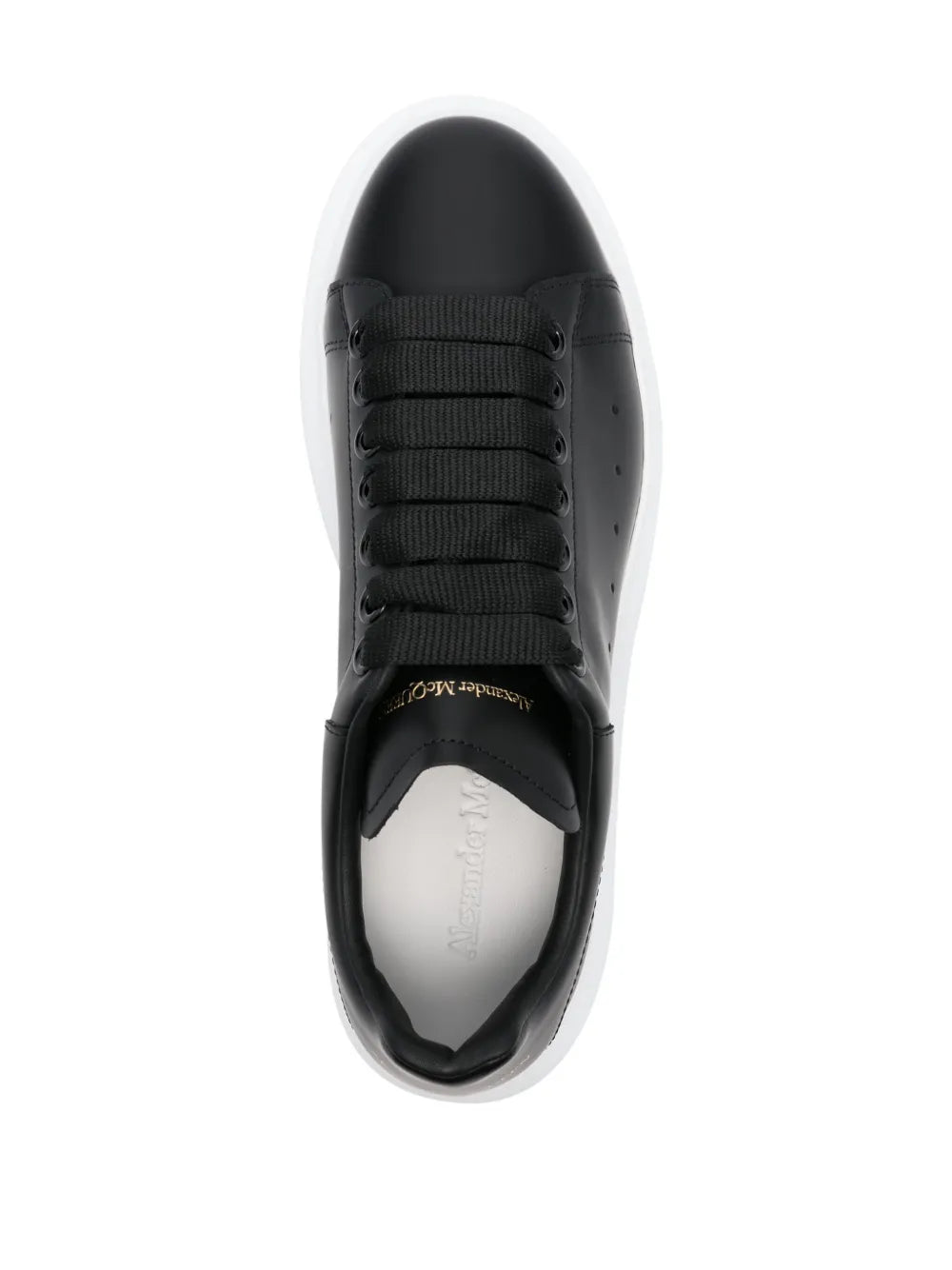 Black lace-up sneaker with padded collar and interior label, white platform sole