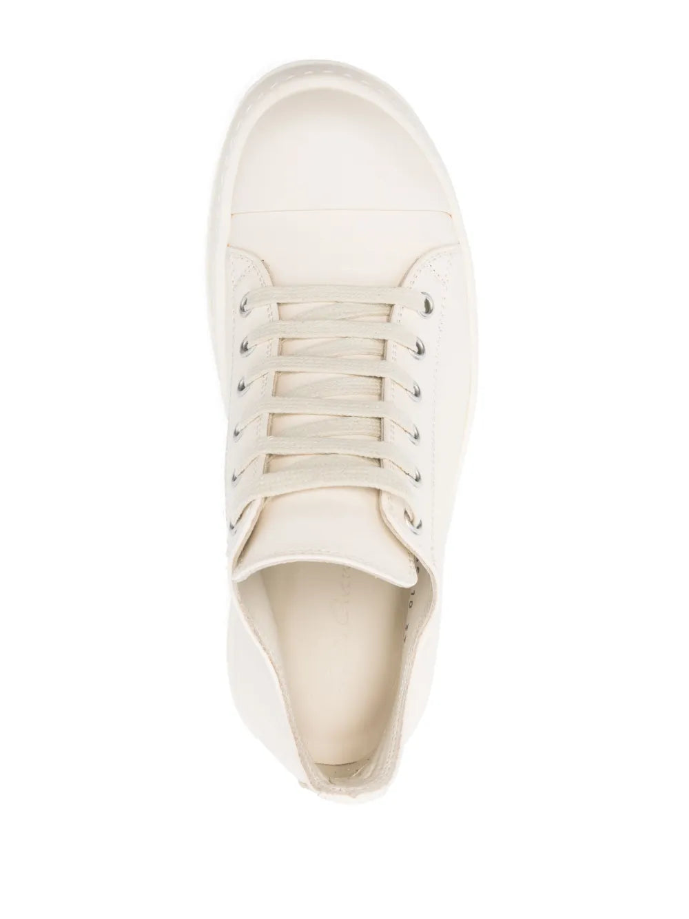 White low-top lace-up sneakers with padded collar and rubber outsole