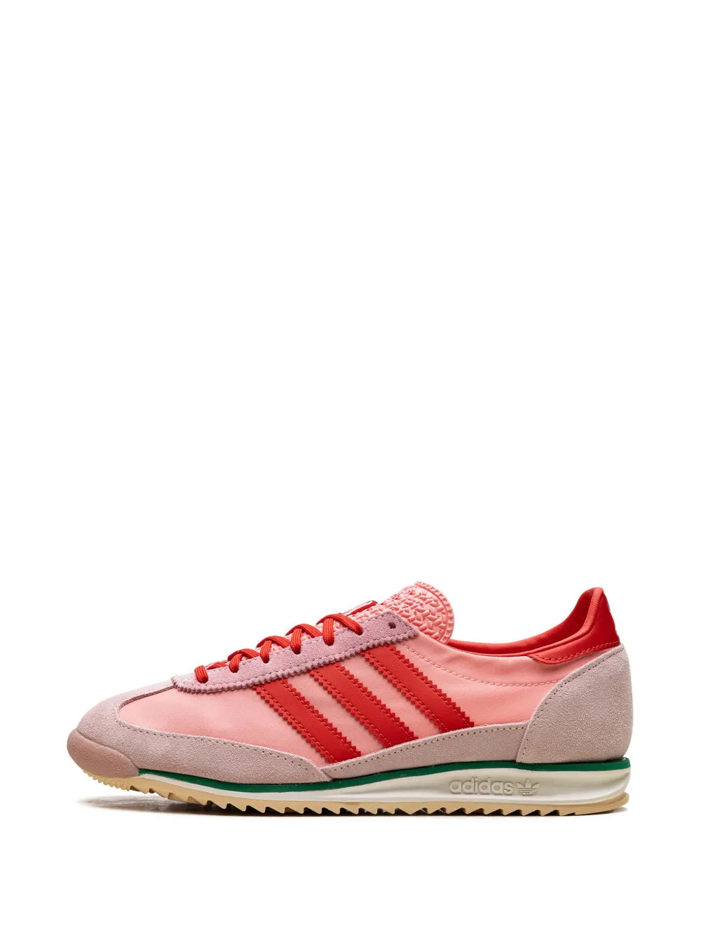Pink low-top sneakers with red laces, three stripes, and cushioned midsole